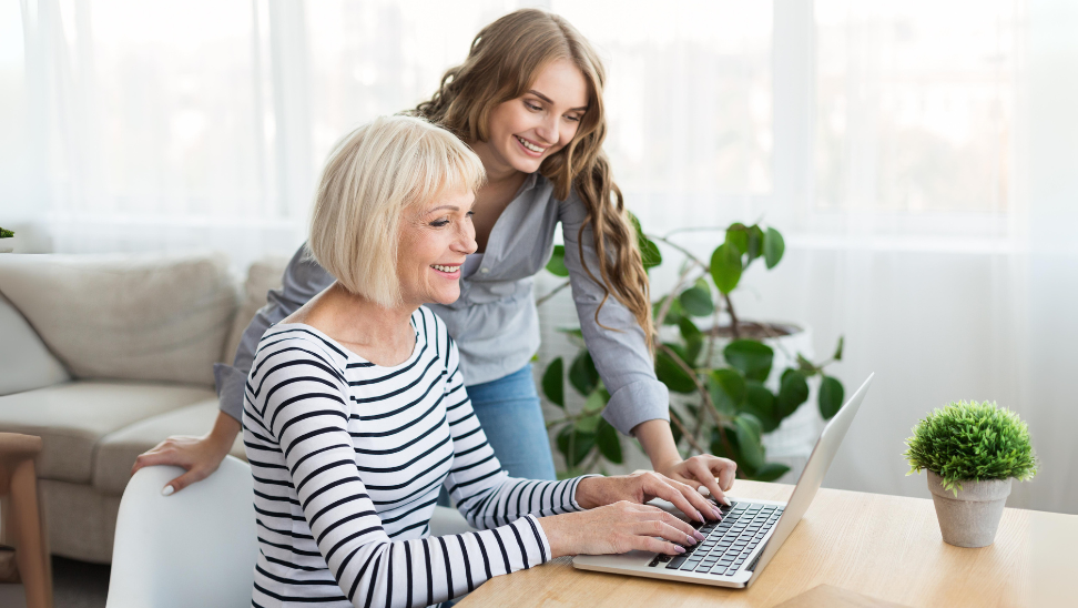 women looking at computer